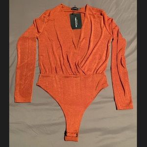 Rusty orange V cut onesie